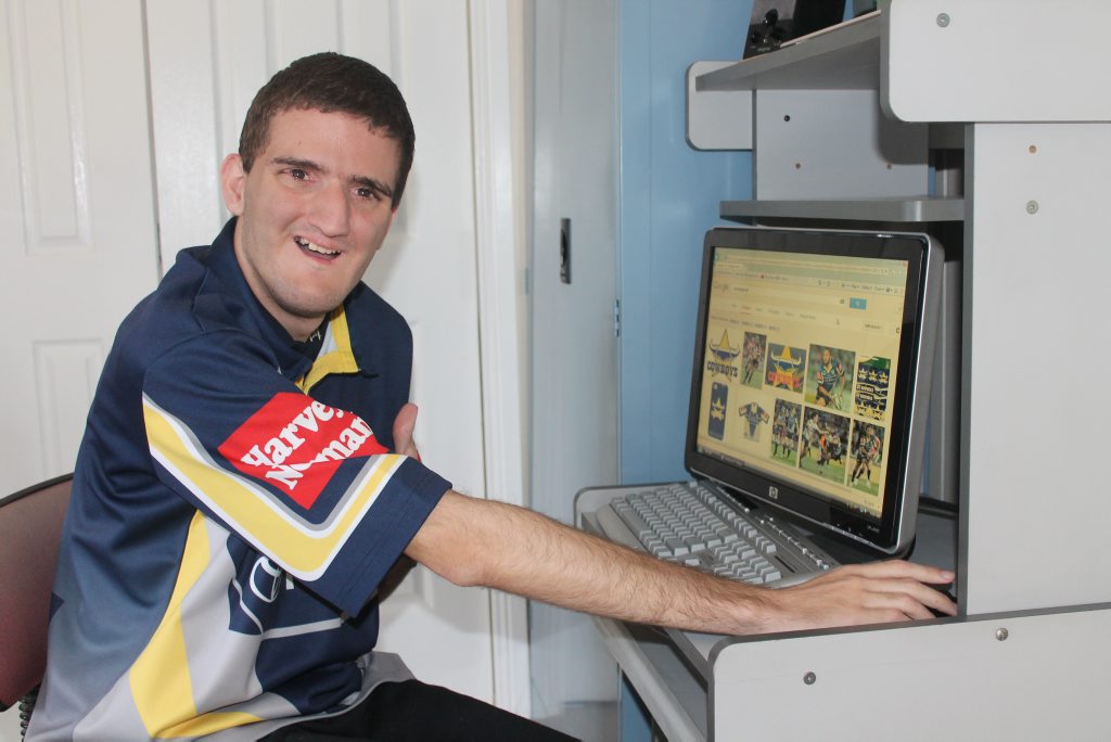 LOVING LIFE: Eighteen year old Jacob Coffey's love of life and dedication to his favourite NRL team the Cowboys are an inspiration to those around him. Photo Linden Morris / Stanthorpe Border Post LOVING LIFE: Eighteen year old Jacob Coffey's love of life and dedication to his favourite NRL team the Cowboys are an inspiration to those around him. Photo Linden Morris / Stanthorpe Border Post